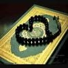نيجيري يهدي مخطوطة قرآنية نادرة للعتبة الحسينية