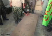Hezbollah receives body of Iranian martyr Hojaji from ISIS